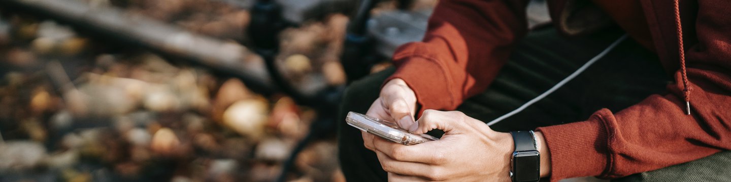 person-hands-phone-autumn.jpg
