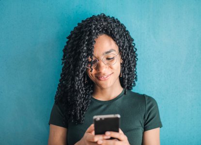 Happy woman texter