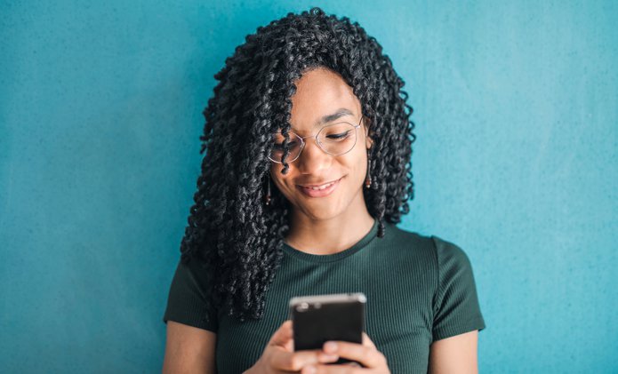 Happy woman texter