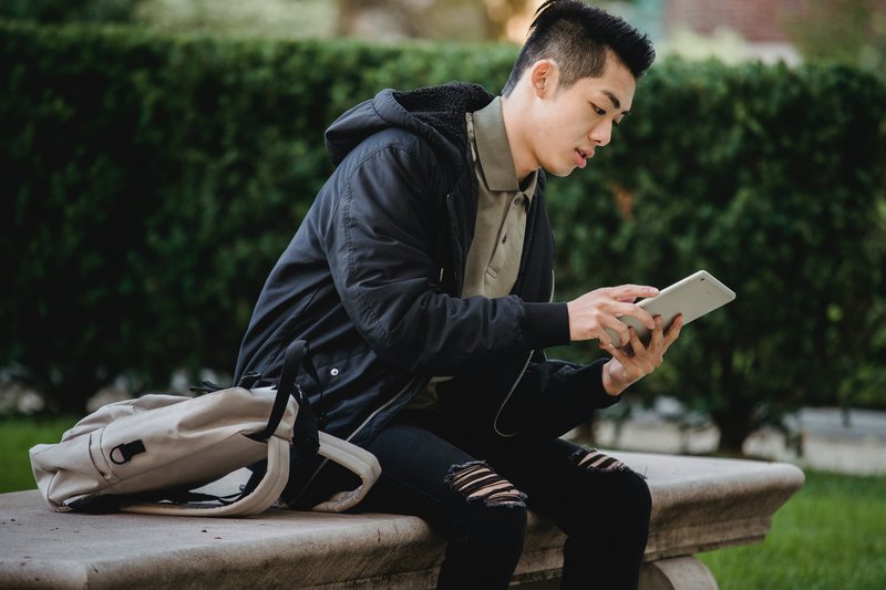 young student on his phone.jpg