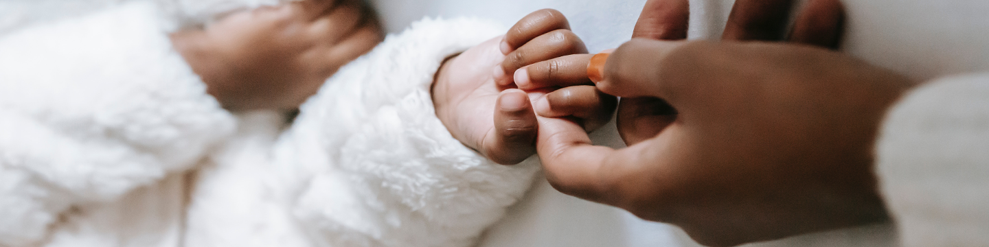 baby-parent-hands-header.png