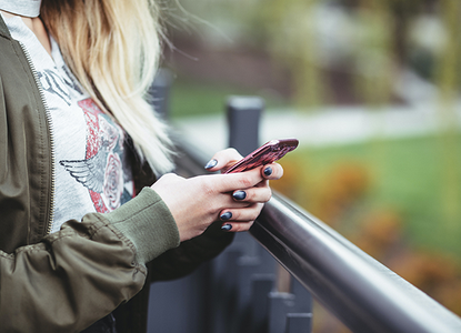 Teenage girl on phone.png