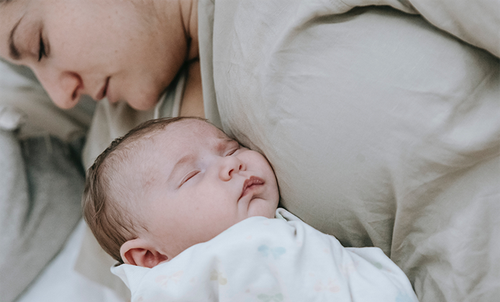 mum-baby-sleeping.png