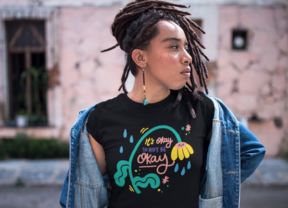 Girl in 'It's Ok To Not Be Ok' t-shirt.png