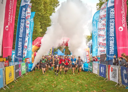 Walkers and runners come across the finish line, excited.png