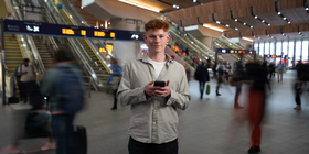 Freddie-smiling-train-station-connection.png