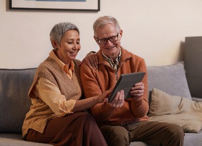 man and woman on ipad - thumbnail