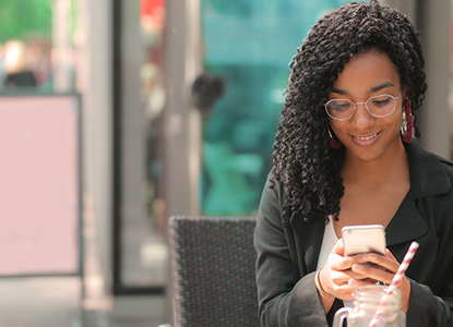 woman-smiling-phone.png